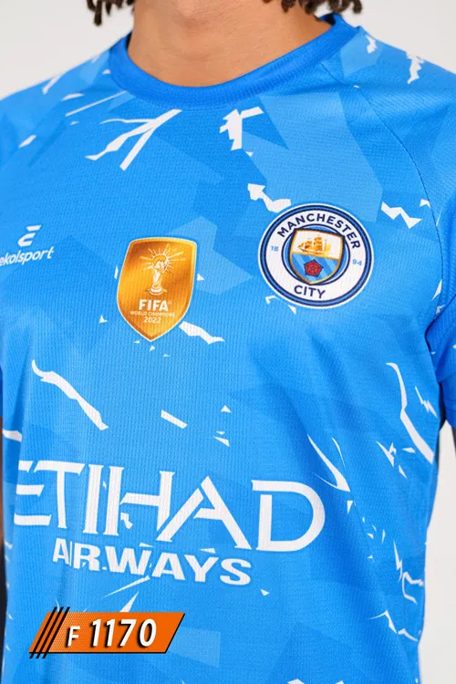 Manchester City Mavi Beyaz Mürekkep Desenli Halı Saha Forması göğüs ve arma detayı F1170